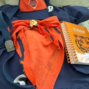 Official Cub Scout uniform set with handbook.